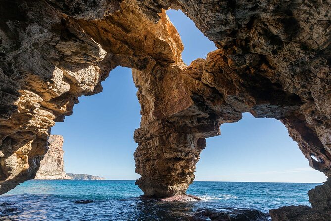 Cala del Moraig Hiking and Beach Trip from Valencia - Cala del Moraig: where the sea cuts through stone arches