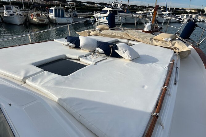Chill and Sail in Valencia - The anchored swim and sun time: mats in the bow