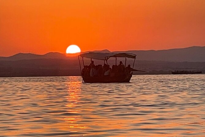 Excursion to the lagoon, sunset and boat ride. - Platja de la Garrofera: virgin beach views without the swim stops