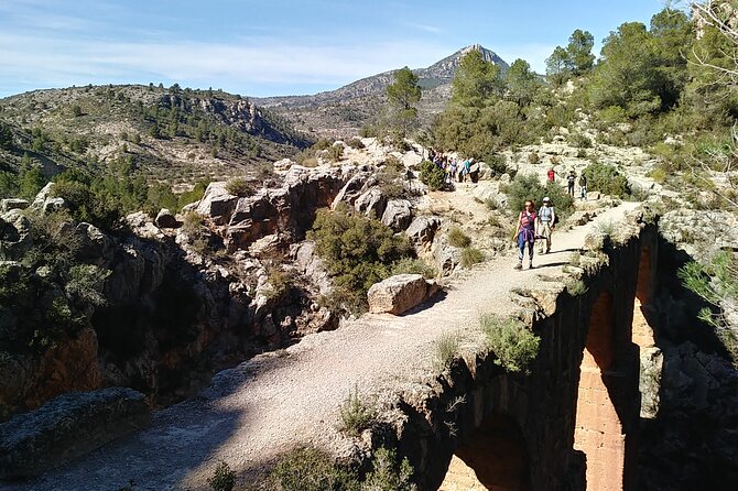 Hike to the Roman aqueduct Peña Cortada - Walking through Peña Cortada’s rock-cut tunnels and crossing the aqueduct bridge