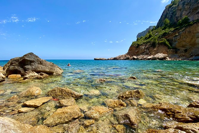 Hiking Cliffs & Old Fishing Trails around Moraira OFFICIAL GUIDE - Cala Llebeig: where the rocks become a refreshing swim pause