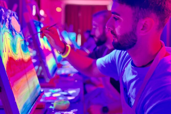 Paint a neon fluorescent picture while drinking unlimited wine - Why fluorescent painting in Valencia feels like a night out