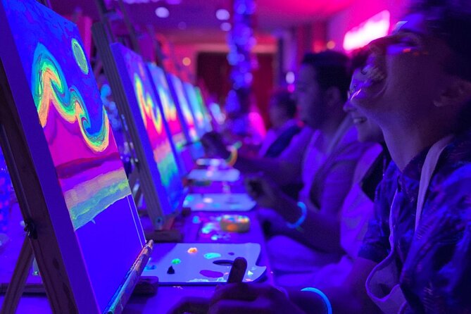 Paint a neon fluorescent picture while drinking unlimited wine - What the 2-hour class structure really means for you