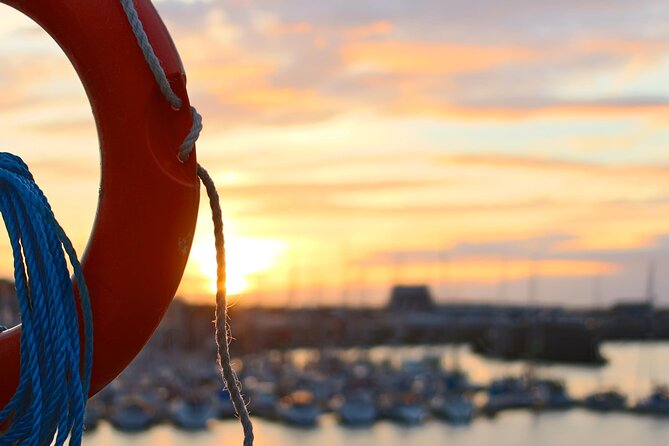 Sunset in Valencia from the Catamaran Mundo Marino - On board experience: nets, seats, cava cup, and toilets