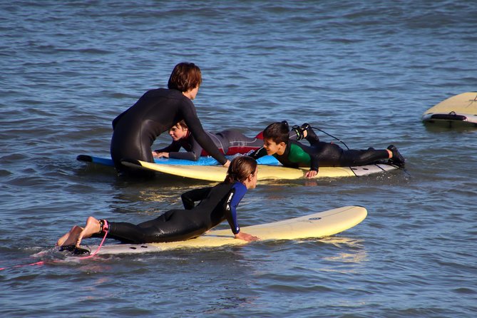 Surf lesson on Valencia beach - In the Water: Getting Tips On Your Attempts