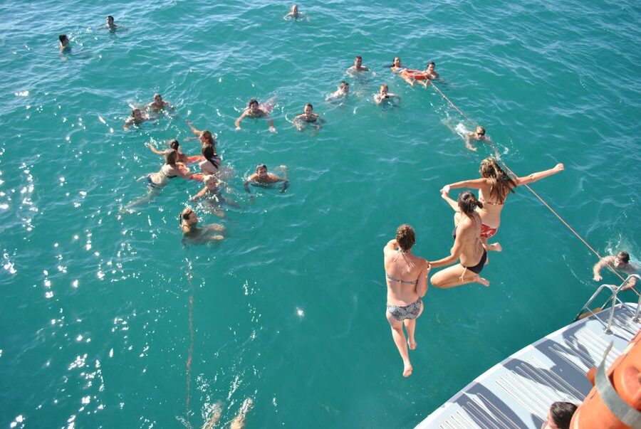 Valencia: Catamaran Cruise, Paella Lunch and Swim Stop - Lunch on Deck: Salad, Chicken Paella, and Fruit That Actually Holds Up