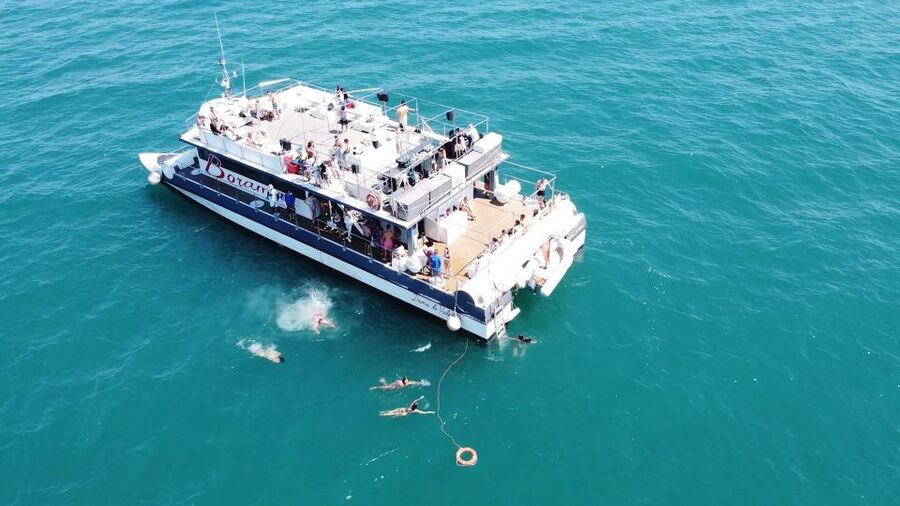 Valencia: Catamaran Cruise with Stop for Swimming - Where the Views Start: Clock Building and La Marina Energy