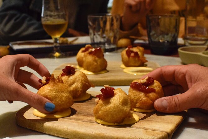 Valencia Centre Food Tour with 9+ Tastings of Regional Delicacies - Stop 5: Fresh Fish Tapas at Plaça del Tossal, 6