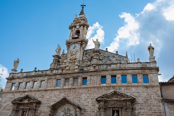 Valencia: City Walk with Audio Guide in 7 Languages on your Phone - Valencia Cathedral: Gothic architecture and Holy Grail stories