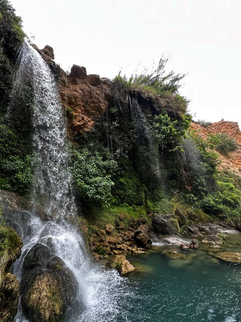 Valencia: Day trip exploring waterfalls, springs and caves - Mineral water channels and a gorge walk that builds confidence