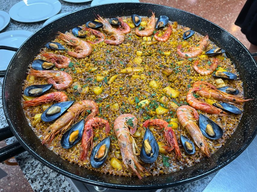 Valencia: Evening Guided Paella Workshop, Tapas, and Drinks - The cooking part: guided steps, not just busy work