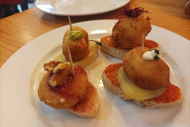 Valencia Food Tour: Tapas, Drinks and Delights with a Local - Stop 1: Plaça del Comte de Bunyol and your first Valencian bite