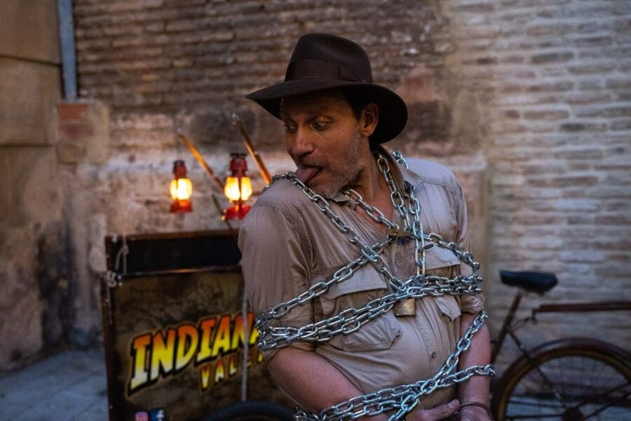 Valencia: 'Indiana Jones and the Holy Grail' Walking Tour - Theater energy: whip tricks, glass-walking, and eating fire
