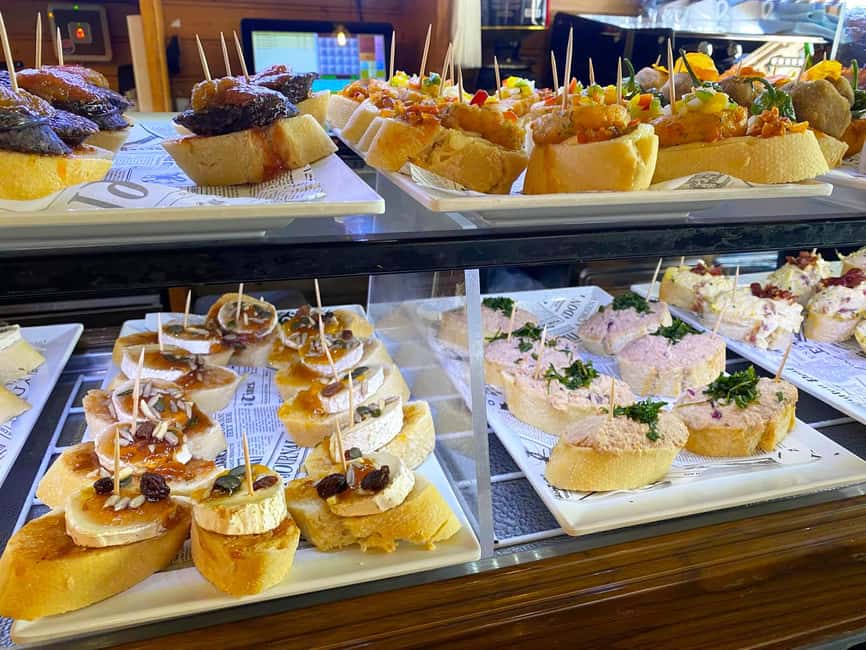 Valencia: Mysteries, Legends, & Local Tapas Experience - Plaza de la Almoina: glass panels over Roman to Christian layers