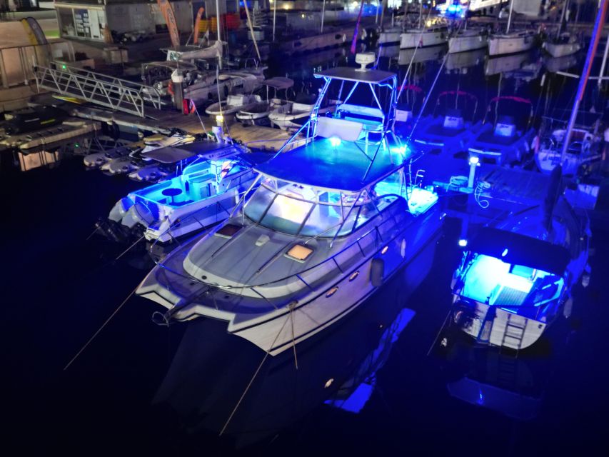 Valencia: Night Cruise with Free Drink - Veles e Vents, Tinglados, and the Clock Building: the skyline “story” from sea level
