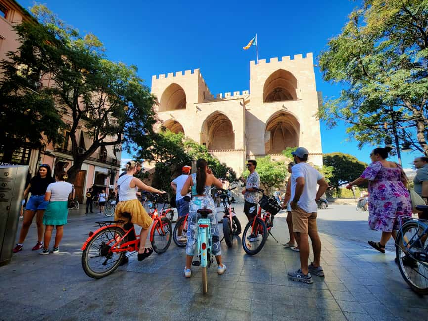 Valencia: Old Town to City of Arts Guided E-Bike Tour - Your ride through the Old Town: Torres de Serranos, the Cathedral, and photo breaks that actually help