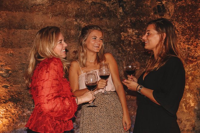 Valencia Old Town Tour with Wine & Tapas in 11th Century Historic Monument - Barrio del Carmen Dinner: Eating in a Special Historic Setting