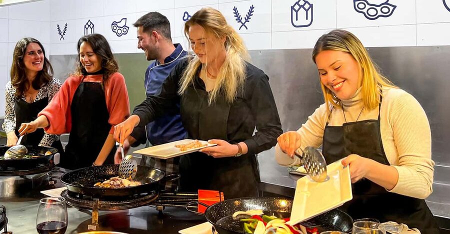 Valencia: Paella Cooking Class with Central Market Tour - Valencia paella, taught the way locals talk about it