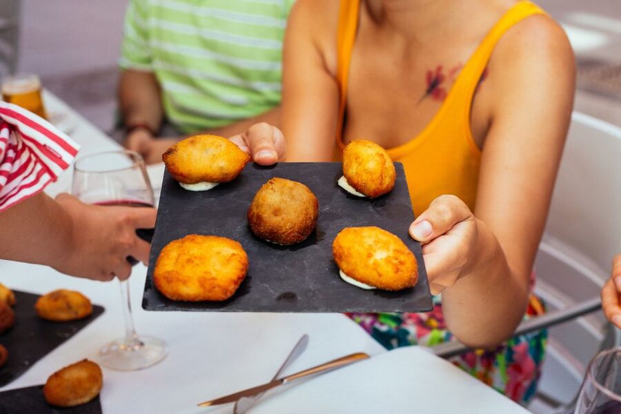 Valencia: Private Food Tour – 10 Tastings with Locals - Manchego cheese and agua de Valencia: the classic you should understand