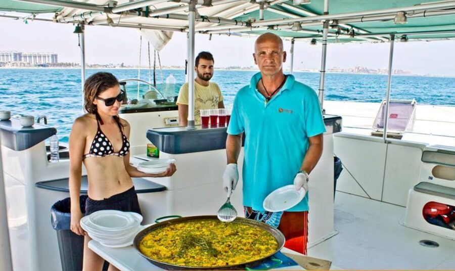 Valencia: Sailing Catamaran Cruise with Valencian Lunch - The Swim Stop: Anchored Near Shore, With Time to Sunbathe