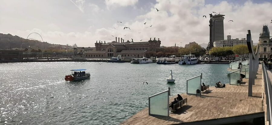 Valencia: Water Beer Bike Tour - The boat setup: sofas, wide deck, and 12 separate seats