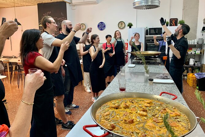 Valencian paella cooking class, tapas and visit to Ruzafa market. - Walking to the kitchen: tapas and sangria as your reset