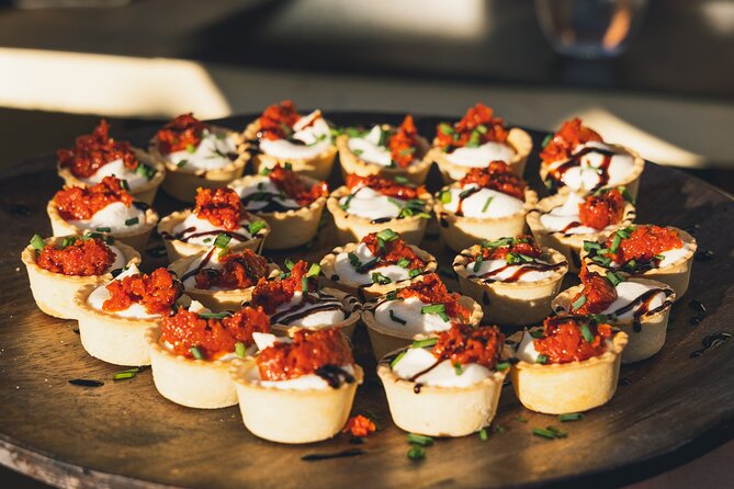 Wine Tasting Experience with a Professional Sommelier in Valencia City Center - Tapas and petit fours: light bites that shape the timing